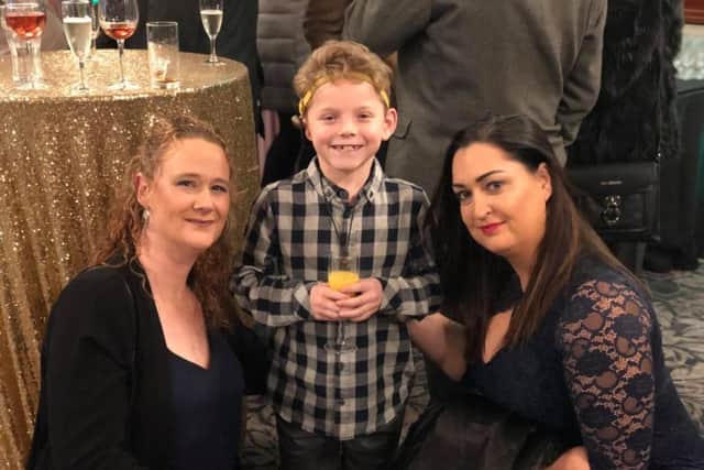 Alex Grant with Gemma Lowery and Lynn Murphy from the Bradley Lowery Foundation.