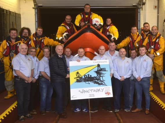Phil Bebbington with RNLI team at the Hartlepool Lifeboat Station.