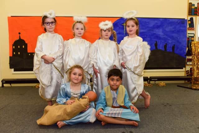 Some of those taking part in the Greatham Primary School Nativity. Pictured l-r standing are Ruby Hunter, Ava Tyler, Arianna Pounder and Ava Vaughan. Seated are Isla Flounders and Ammar Turkistani