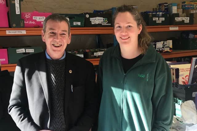Hartlepool MP Mike Hill with food bank coordinator Abi Knowles on a visit to the charity in Church Street.