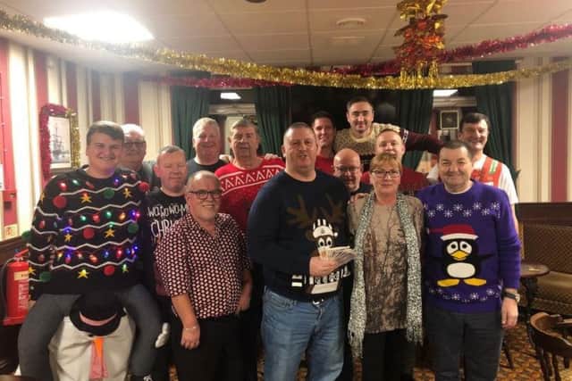 Members of the South Durham (Steelworks) Club in their Christmas jumpers.