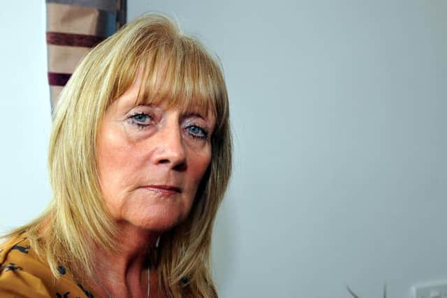 Julie Fletcher is appealing for information on her missing son Scott .