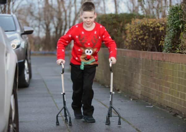 Alfie Smith, 11  second Christmas since undergoing life changing surgery to help him walk.