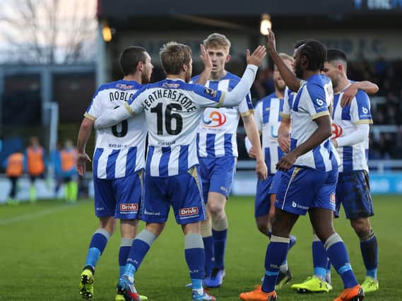 Pools' players celebrate Liam Noble's 18th minute strike.