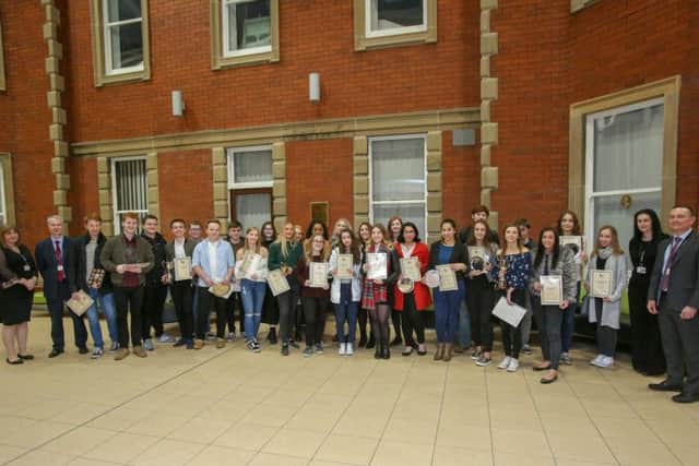 All of the student award winners with Mark Hughes, head of Hartlepool Sixth Form College, on the far right.