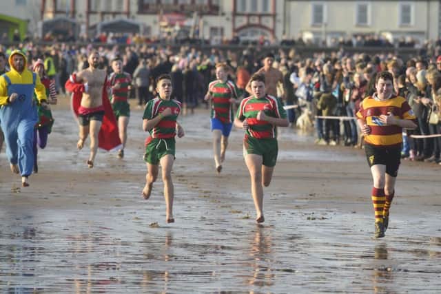 Boxing Day dippers pictured taking part in the annual event at Seaton Carew.