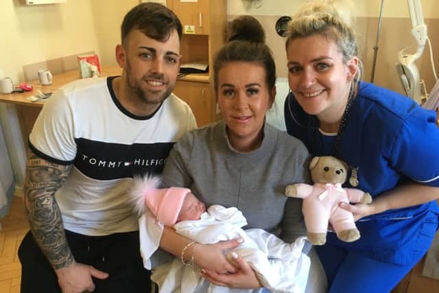 Parents Alice and Kyle Crowley from Peterlee with daughter Aria Belle Crowley at Sunderland Royal Hospital on New Year's Day.