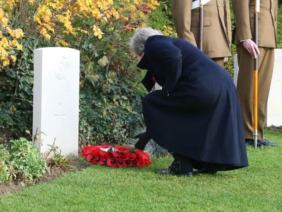Theresa May lays a wreath at the grave of fallen Hartlepool solider George Edwin Ellison.