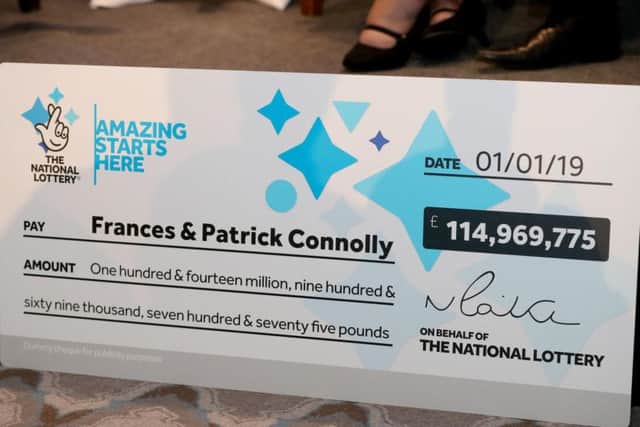 The winning cheque. Picture: PA.