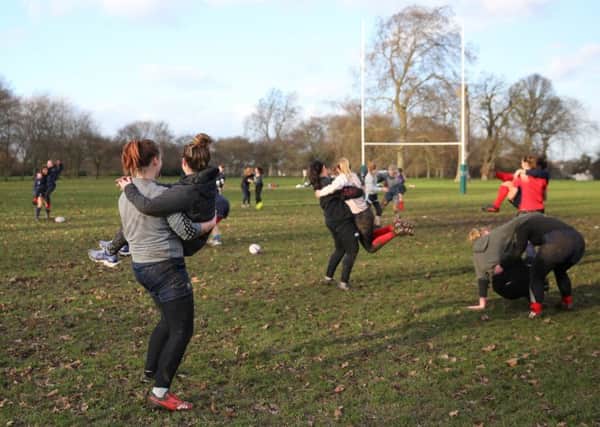 Women are being encouraged to take up rugby