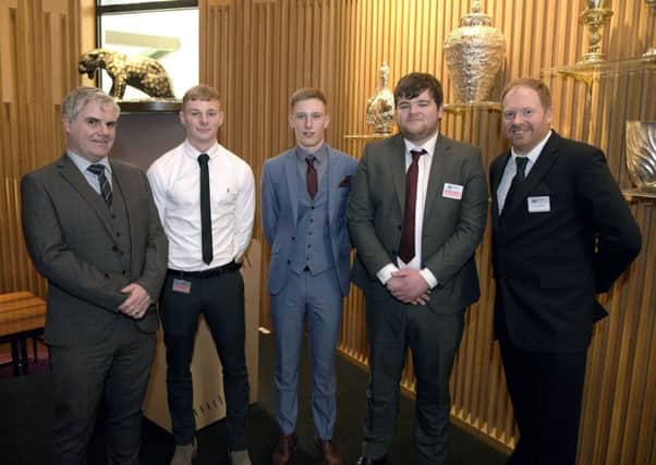 Left to right, Brian Jorgenson, Academic Training Coordinator TTE, Liam Walpole, Joshua Ward, Quinn Hoban and Chris Weldon, Student Success Coordinator TTE at Salters' Hall, London.