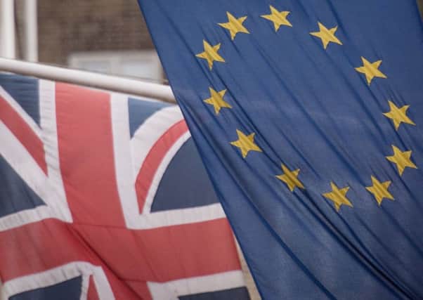 EU and Union flags. Picture: Stefan Rousseau/PA Wire.