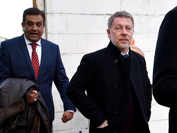 Hartlepool United manager Craig Hignett is flanked by owner Raj Singh.