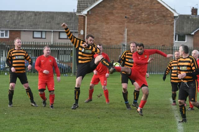 Stag & Monkey o40s (yellow/black) v  Newcastle East End o40s (red) at Manor College, Hartlepool on Saturday.