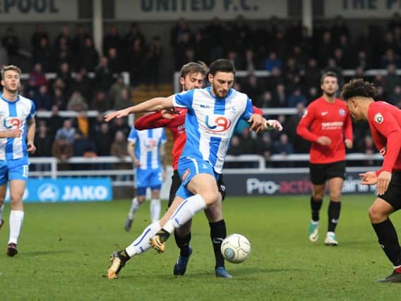 Jake Cassidy in action for Pools against Gateshead last season.
