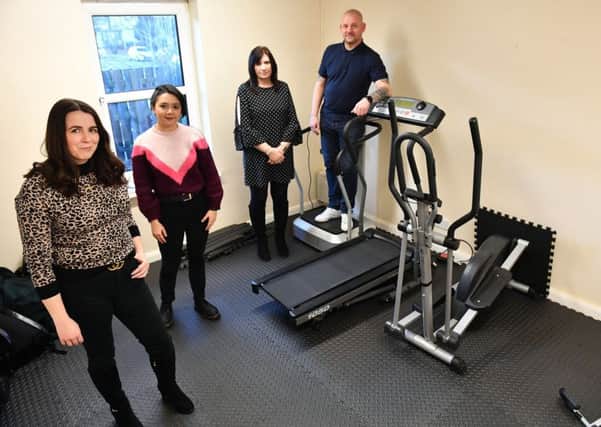 Staff at Sanctuary Supported Living delighted by the new gym equipment. Picture by Frank Reid.