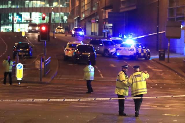 Emergency services at Manchester Arena after reports of an explosion at the venue during an Ariana Grande gig. Picture: Peter Byrne/PA Wire.