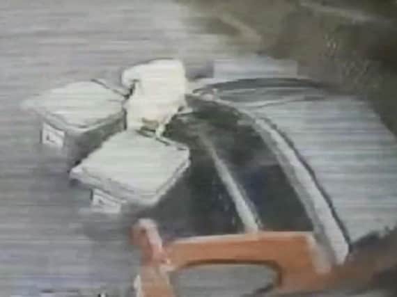The moment a Hartlepool Borough Council bin worker was almost hit by a car.