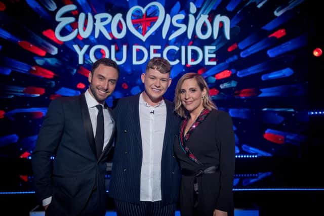 Michael with hosts Mans Zelmerlow and Mel Giedroyc