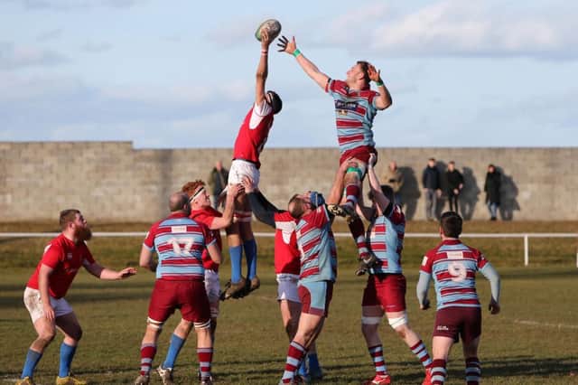 Horden and Peterlee (mauve and blue) v Stockton (red) rugby action. Picture by Tom Banks.