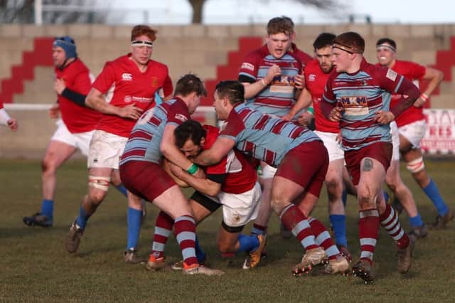 Horden and Peterlee (mauve and blue) v Stockton (red) rugby action. Picture by Tom Banks.