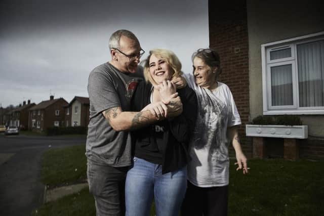 Trevor Pickard and carer Tracy Taylor with their daughter Tamsyn. 
Image by Channel 4.