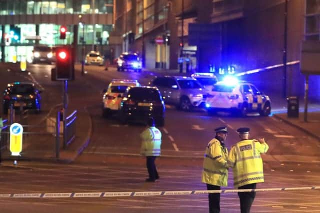 Police at the scene of the Manchester Arena terror attack. Picture: Peter Byrne/PA Wire