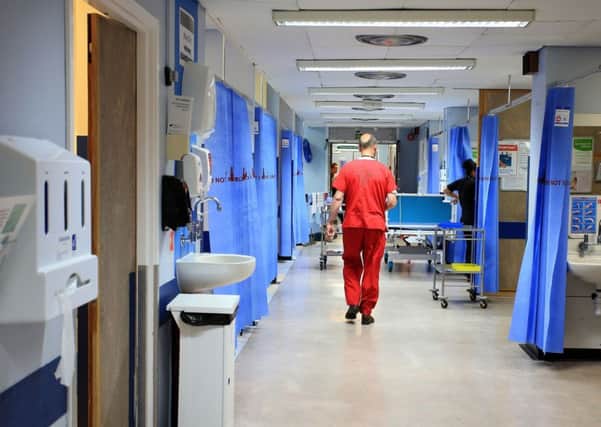 The government says its 10-year plan for the NHS will see its budget increase by £33.9 billion. Photo credit Peter Byrne/PA Wire.