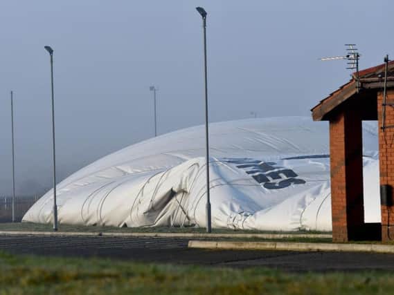 The deflated large dome pictured on Sunday.