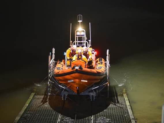 Hartlepool RNLI inshore lifeboat and volunteer crew shown returning to the Ferry Road lifeboat station on Tuesday morning.