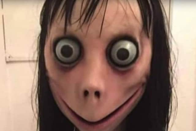 The scary doll-like character said to appear in the Momo videos.