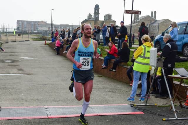 Winner Dominic Shaw wins last year's Hartlepool Marina 5-mile Road Race in a new record time of 24mins 14 secs.