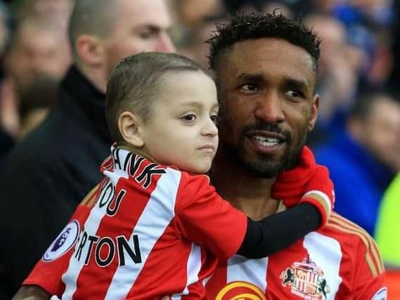 The pair together at the Stadium of Light when Bradley acted as mascot for the club.