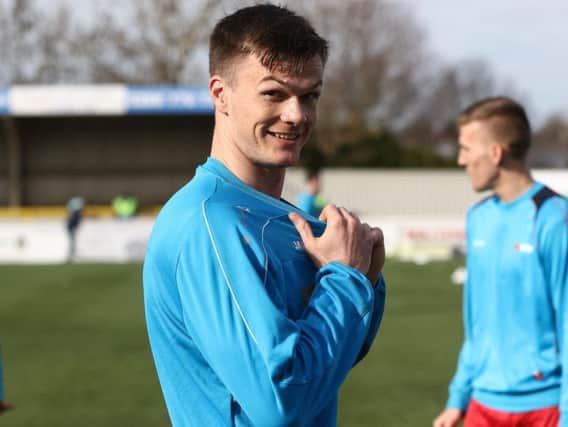 Former Motherwell defender Fraser Kerr warms up before last weekend's 2-2 draw at Sutton United.