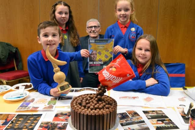 Fairtrade Fortnight chocolate competition with winners Throston Primary School. Pupils from left Oliver Harrison, 8, Annalise Frater, 10, Neve Watson, 9 and Sadie Jukes, 10 with Deputy Mayor Rob Cook.