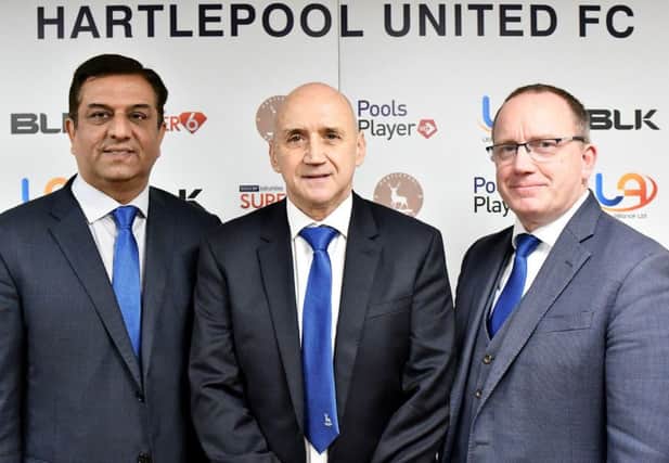 Raj Singh and Mark Maguire with Richard Money (centre).