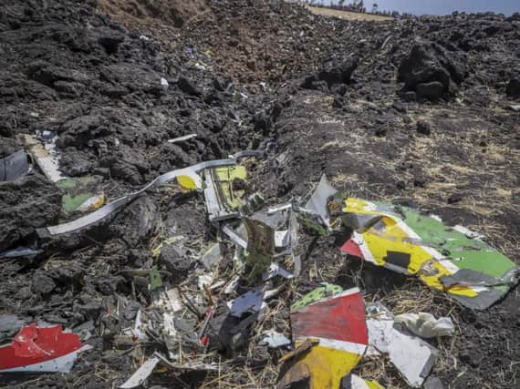 Wreckage lies at the scene of an Ethiopian Airlines flight that crashed shortly after takeoff at Hejere near Bishoftu, or Debre Zeit, on March 10. Picture: AP Photo.