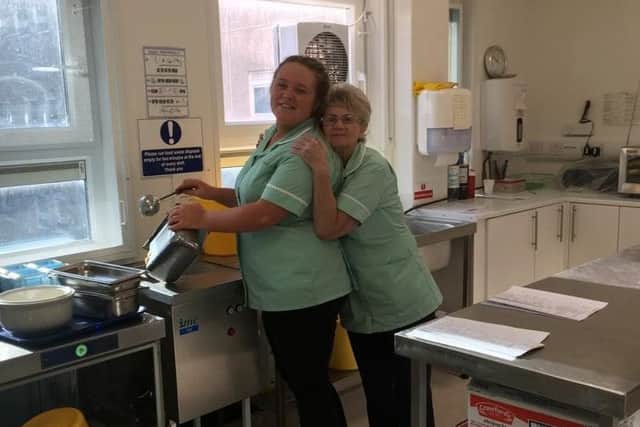 Megan Adams (right) having fun learning about catering at Hartlepool Hospital.