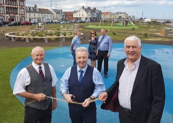 Peter Stephenson, Executive Chairman of Able UK which contributed £100,000 to the project, with Councillor Christopher Akers-Belcher and Councillor Kevin Cranney perform the ribbon-cutting ceremony.