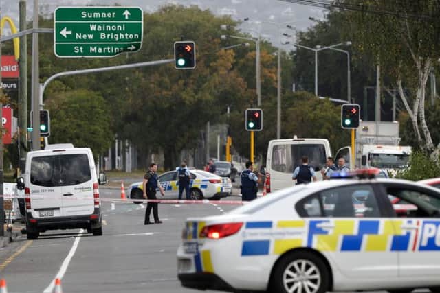 Police block the road near the shooting at a mosque in Linwood, Christchurch, New Zealand, Friday, March 15, 2019. Multiple people were killed during shootings at two mosques full of people attending Friday prayers. (AP Photo/Mark Baker).
