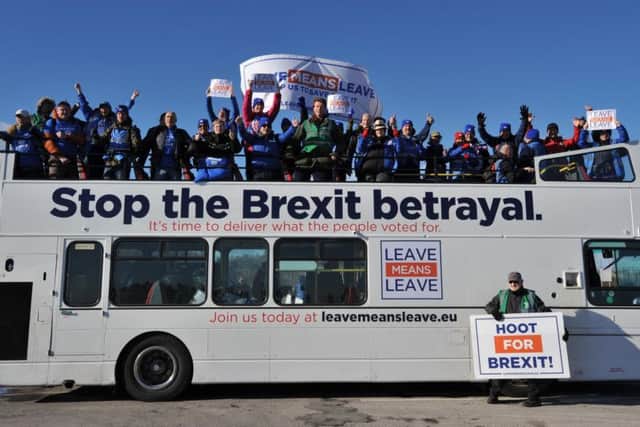 Campaigners on the Leave means Leave bus.