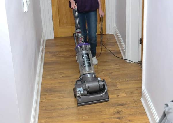 Vacuuming can cause back pain.