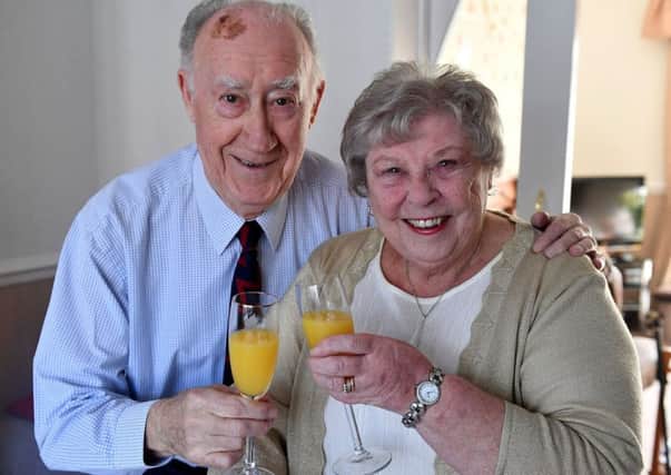 Roger and Hilda Morrow celebrating their diamond wedding anniversary.