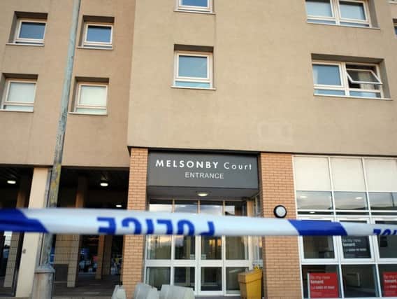 Police cordoned off the scene after Peter Gilling was stabbed outside Melonsby Court, Billingham.