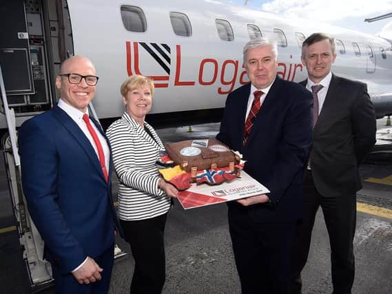 Newcastle Airport and Loganair officials at the launch of the airline's new services.