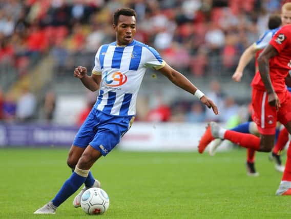 Marcus Dinanga playing against Leyton Orient for Hartlepool United earlier this season.