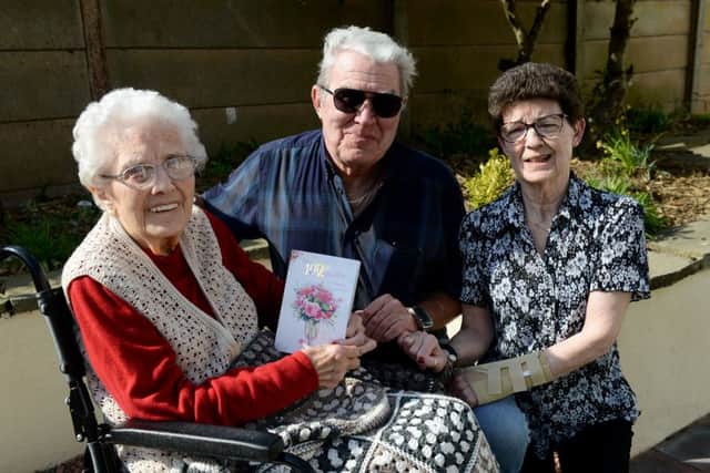 Kitty Dennis on her 102nd birthday with her daughter Lynn Taylor (70) and son Geoff (74). Picture by FRANK REID