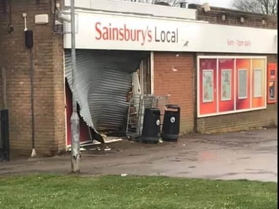 The damage done to the Sainsbury's store following the ram raid.