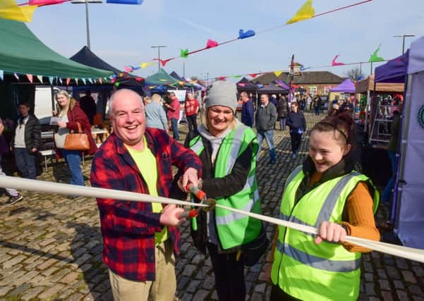 Launch of Hartlepool Maritime Market took place at the National Museum of the Royal Navy, Hartlepool, on Saturday, with Coun Dave Hunter cutting the ribbon helped by organiser Fiona Harnett and Freja Harnett.