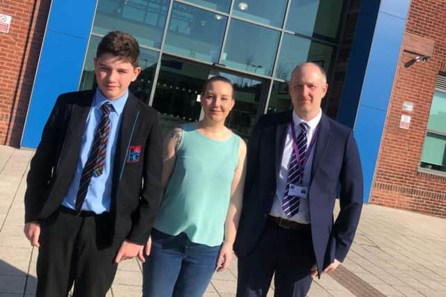 Dyke House Academy pupil Charlie Shepherd with Samantha Reay, who he helped to save, and Vice Principal James Almond.